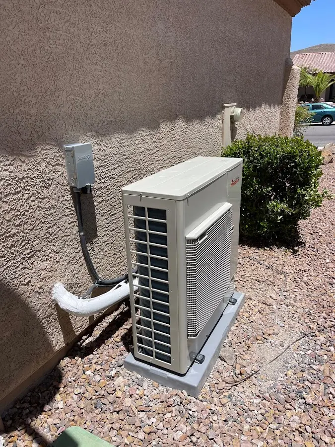 Residential air conditioning condenser unit in Willmar